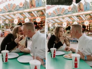 Couple sitting together eating pizza on the bench