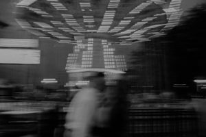 B&W motion blur pic of nighttime rides in Adventureland