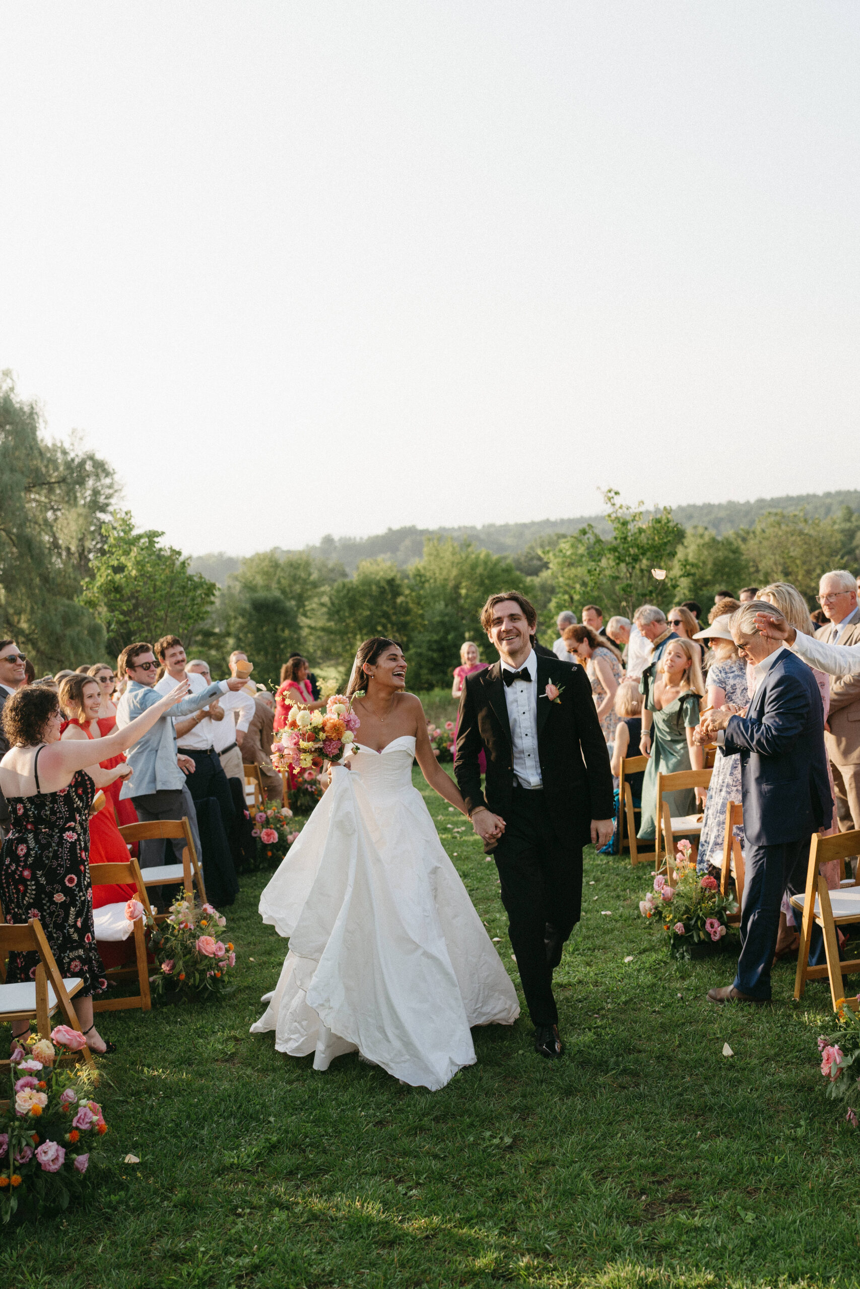 bride and groom walking down the aisle